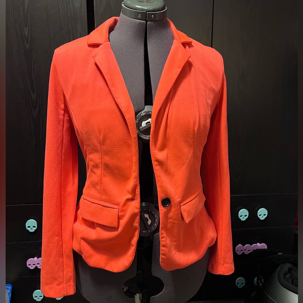 Bright orange blazer